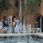 USC Leonard Davis School fountain and courtyard with students