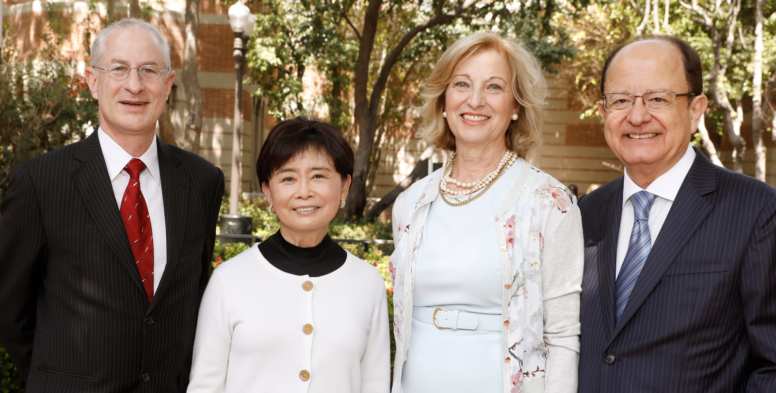 Pictured left to right: Dean Pinchas Cohen of the USC Leonard Davis School, Mei-Lee Ney, Niki Nikias and USC President C.L. Max Nikias