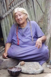 Tsimané older adult sitting