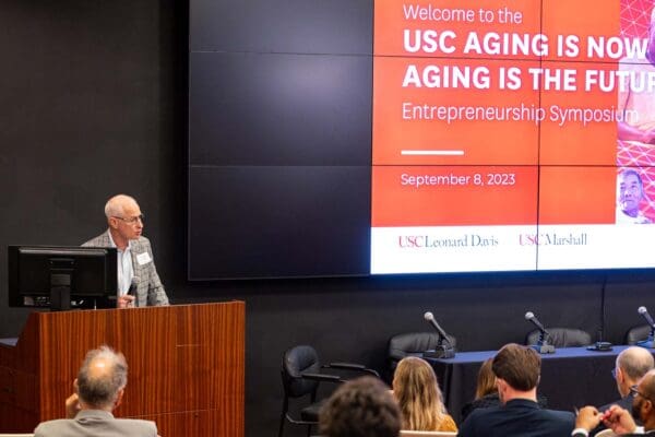 Dean Pinchas Cohen presenting the Symposium on Future of Aging