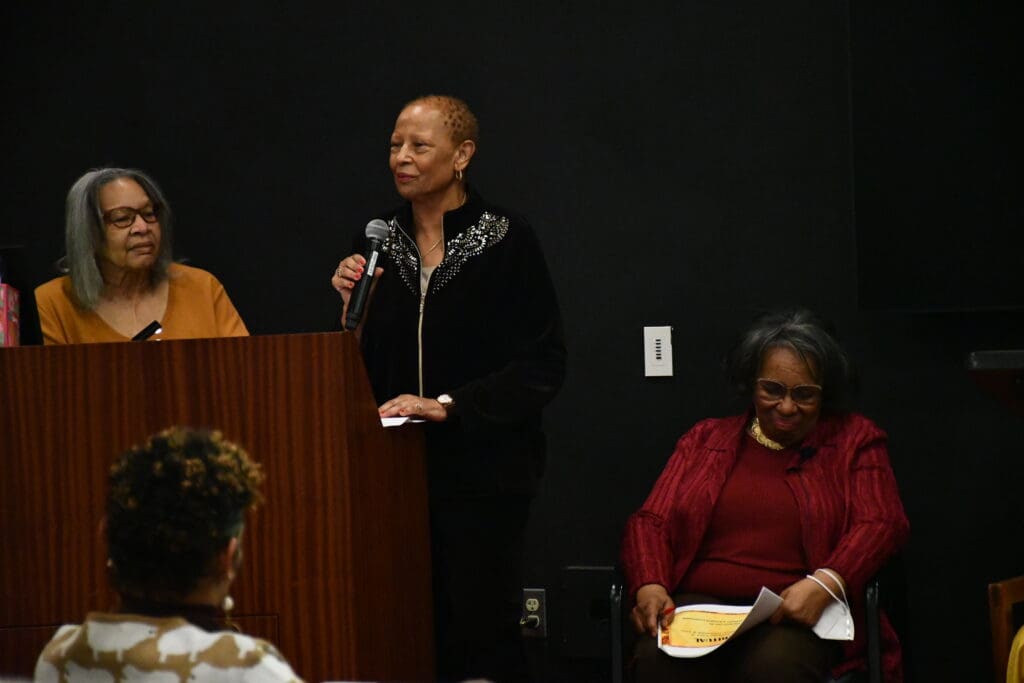 Sisters Sharon Melancon and Jeanie Harris giving a speach at Black History month celebrations