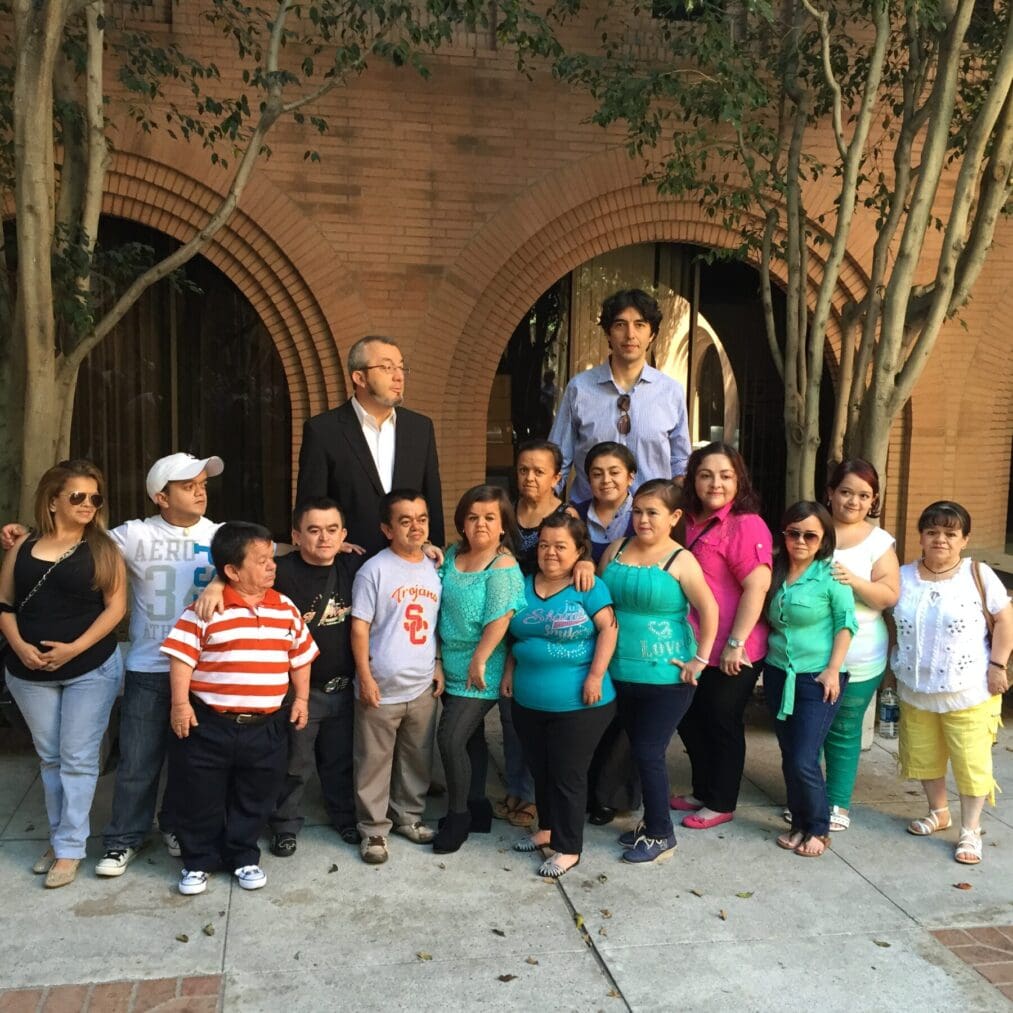 Jaime Guevara-Aguirre, Valter Longo, and several of the Laron study participants at the USC Leonard Davis School