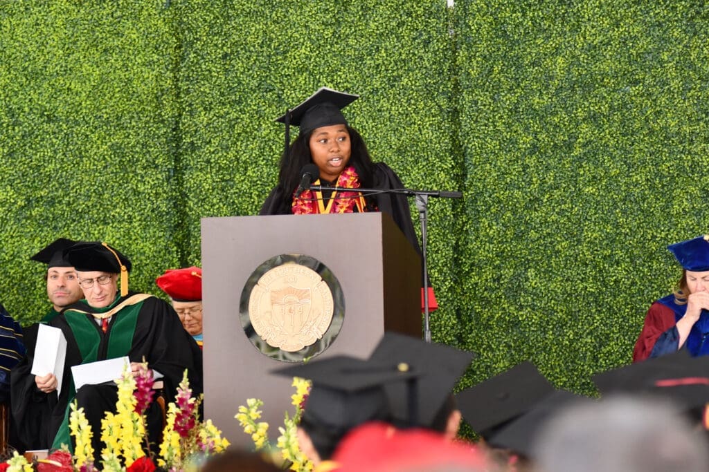 SGA President & undergraduate speaker Aaliyah Thomas on podium