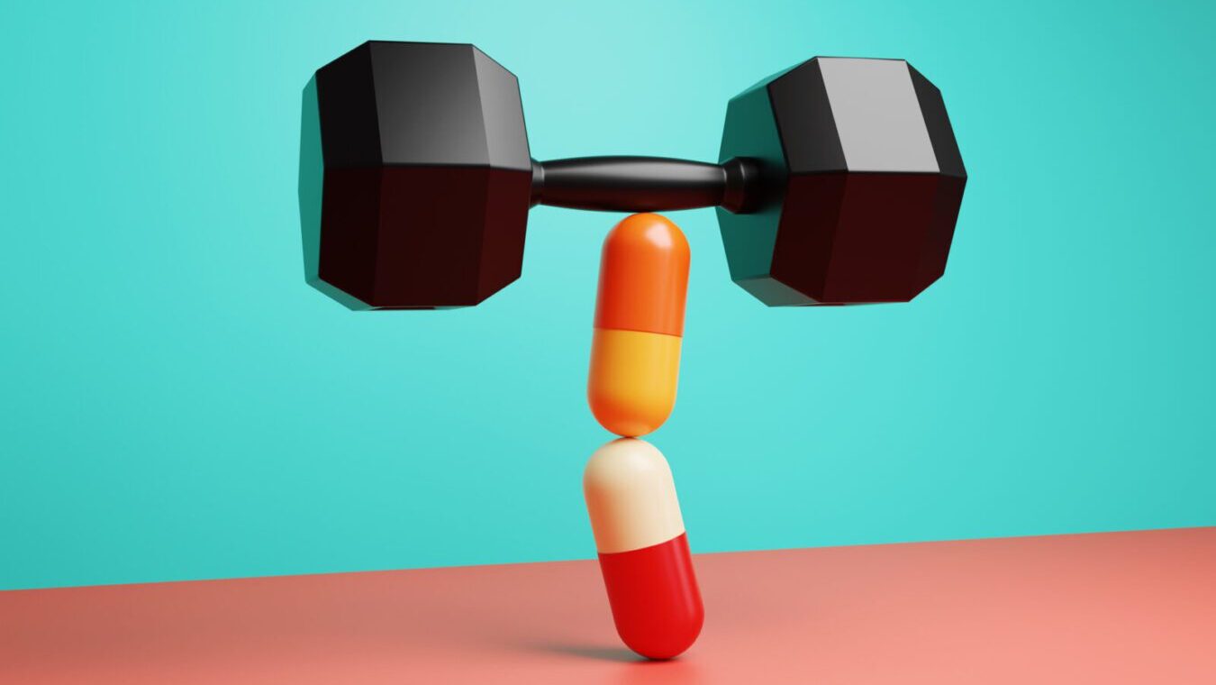 Colorful capsule pills lifting a black hex dumbbell. Illustration of the concept of pharmaceutical research on pills to replace exercise and workouts